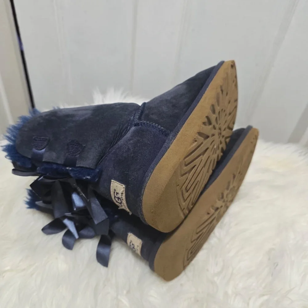 UGG Kid’s Bailey Bow II boots in a navy blue suede